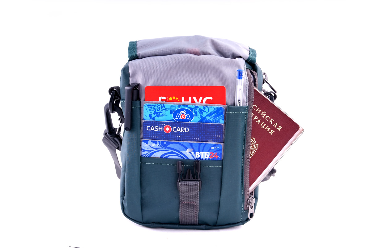 Универсальная дорожная сумочка из водоотталкивающей ткани Tatonka Check In  CLIP blue
